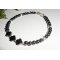 Originale bracciale di fiori e piccole pietre in ematite con tubi in argento 925