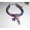 Bracciale in tessuto colorato con nappe a forma di cavalluccio marino e stella marina viola